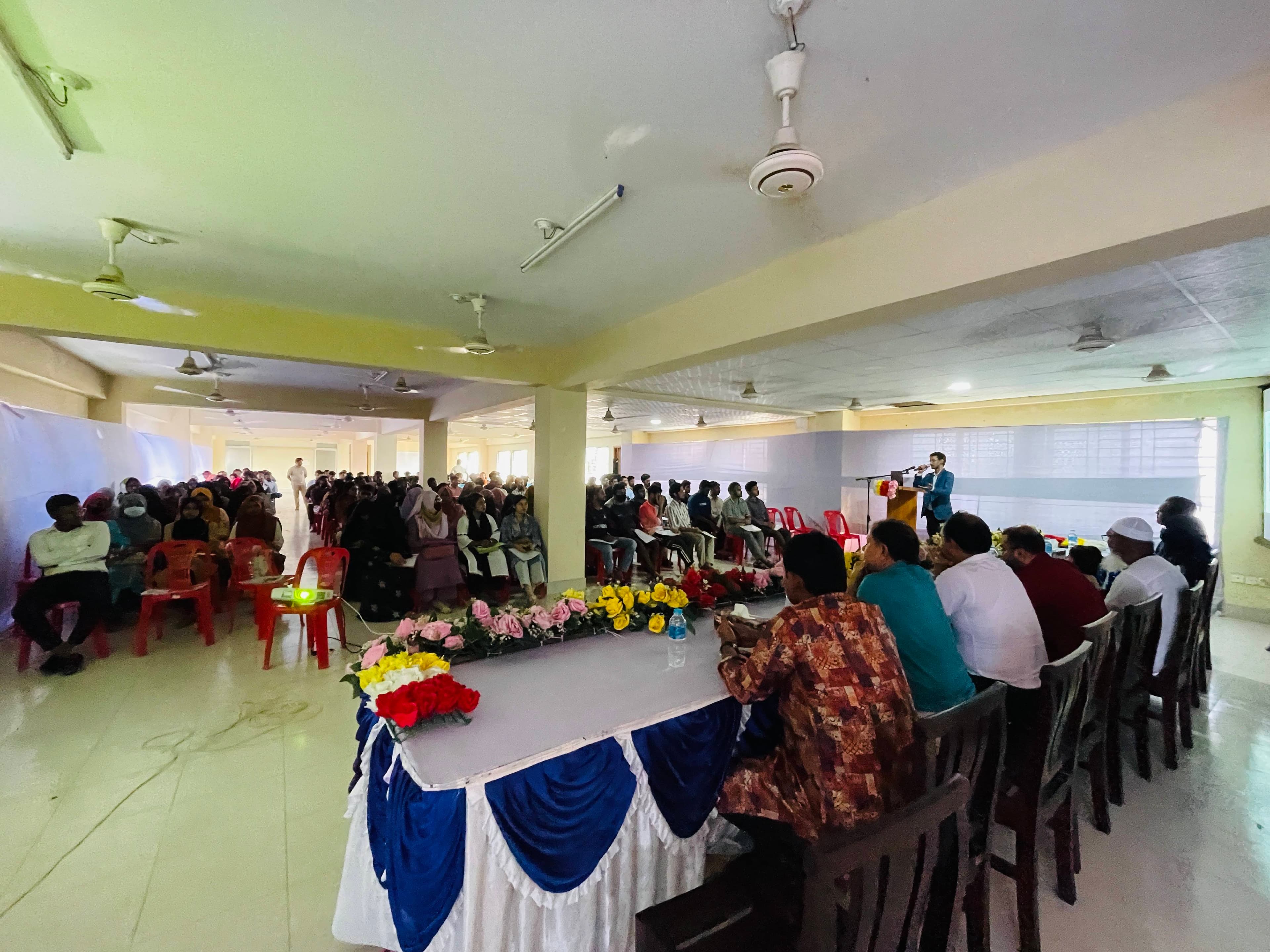 Group photo of guests, teachers, KRTC team, and students at the Pabna seminar