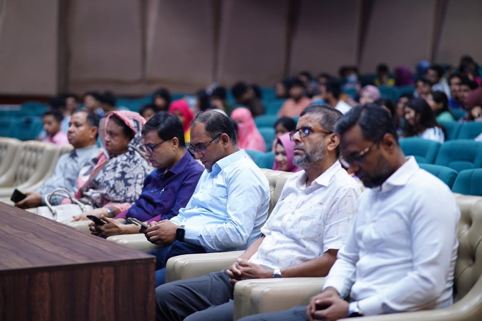 Distinguished academic guests at the Dhaka seminar